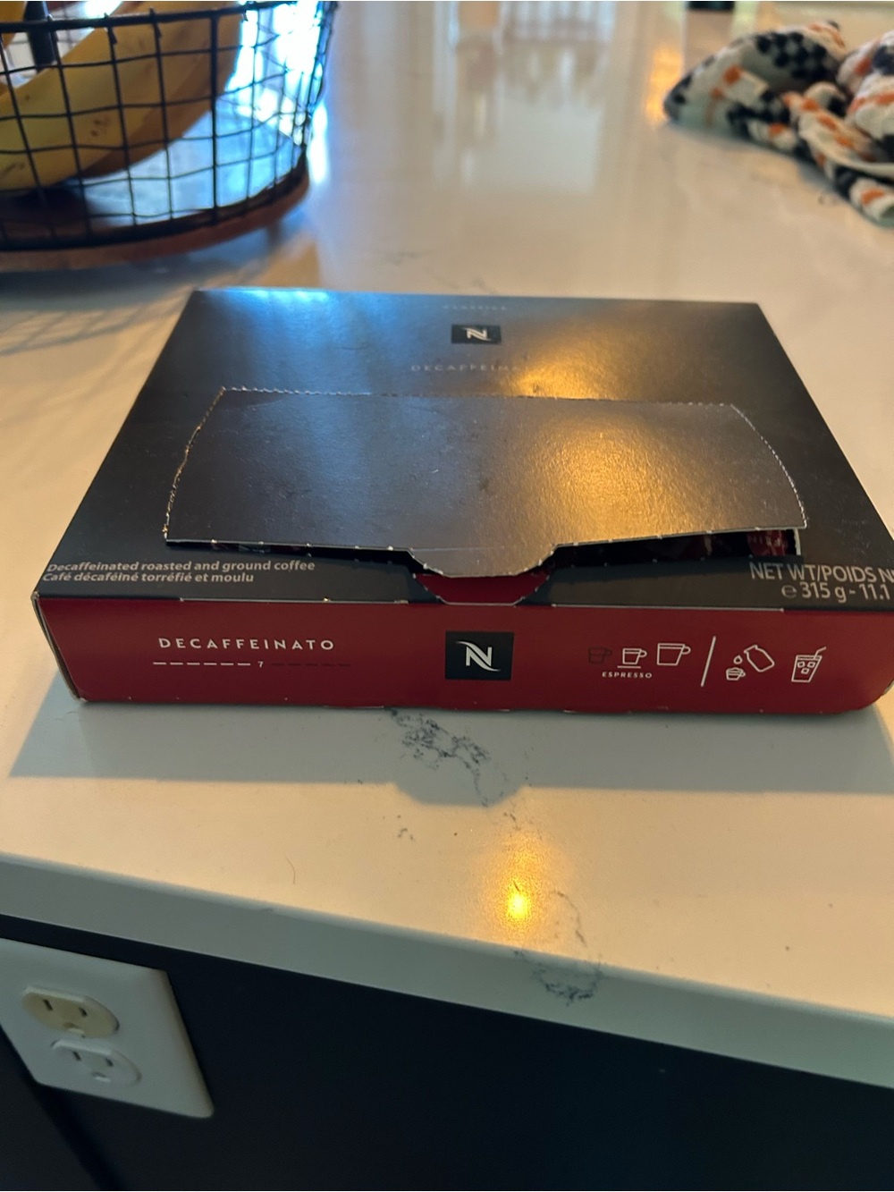 Nespresso Red & Black Decaffeinato Coffee Capsule and Box